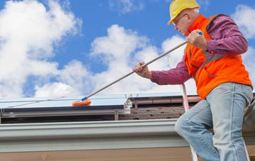 The Howe soft wash roof cleaning